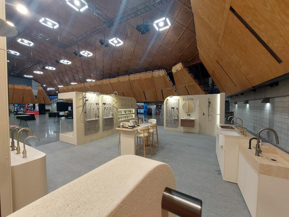 Side view of Nero Tapware exhibition stand with live tap displays and integrated lighting